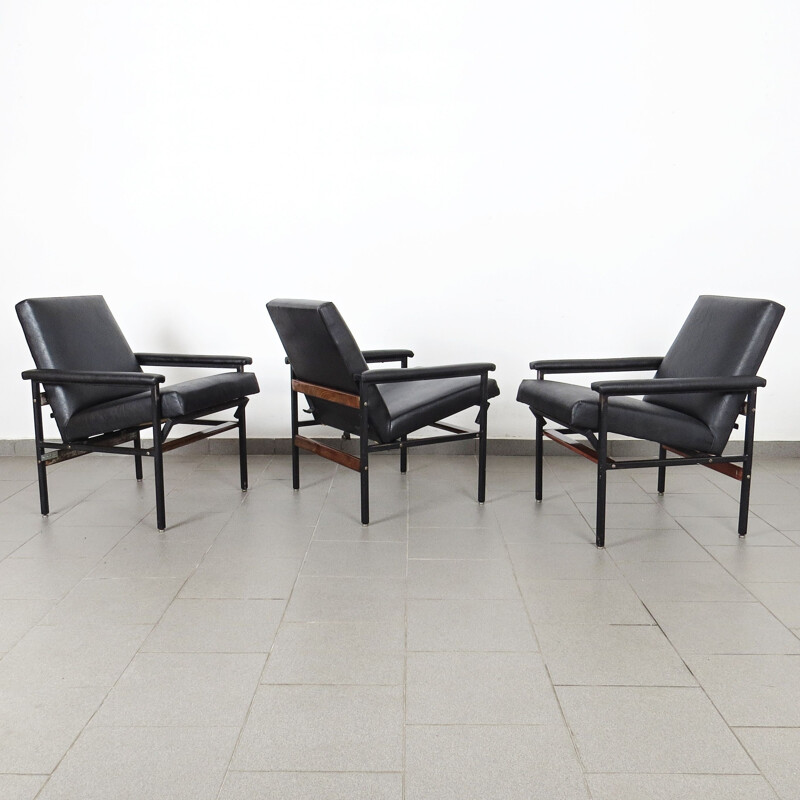 Vintage black armchairs 1960s