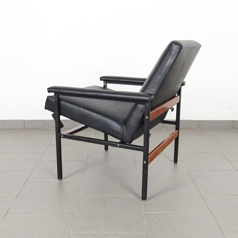 Vintage black armchairs 1960s