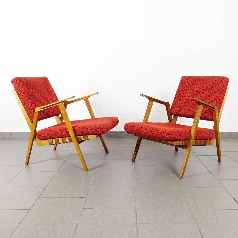 Vintage red armchairs circa 1960