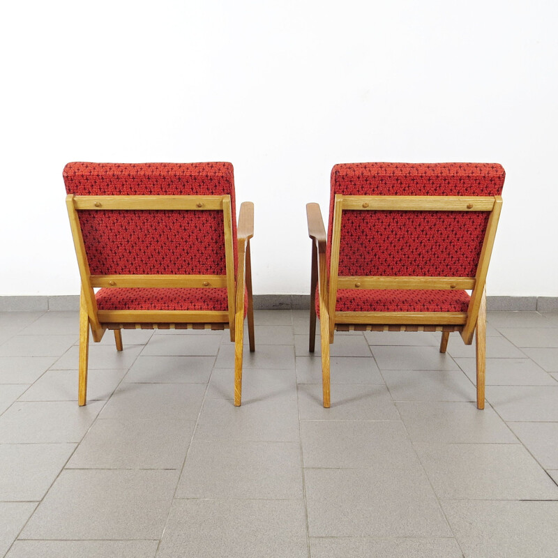 Vintage red armchairs circa 1960