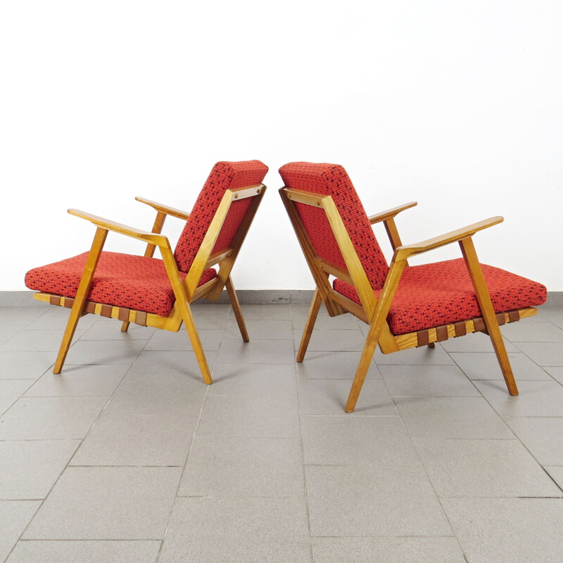 Vintage red armchairs circa 1960