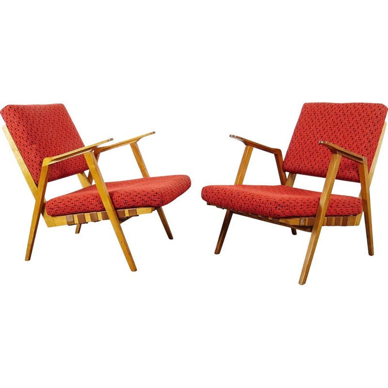 Vintage red armchairs circa 1960