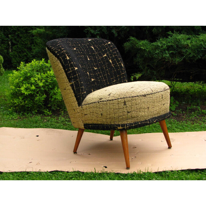 Vintage armchair on straight legs 1970