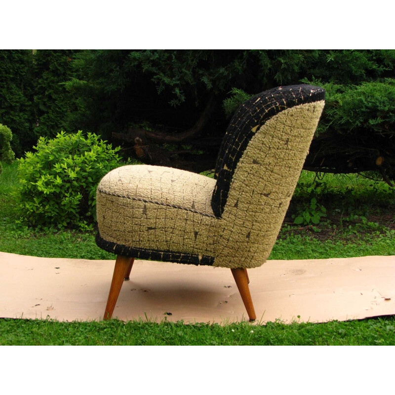 Vintage armchair on straight legs 1970