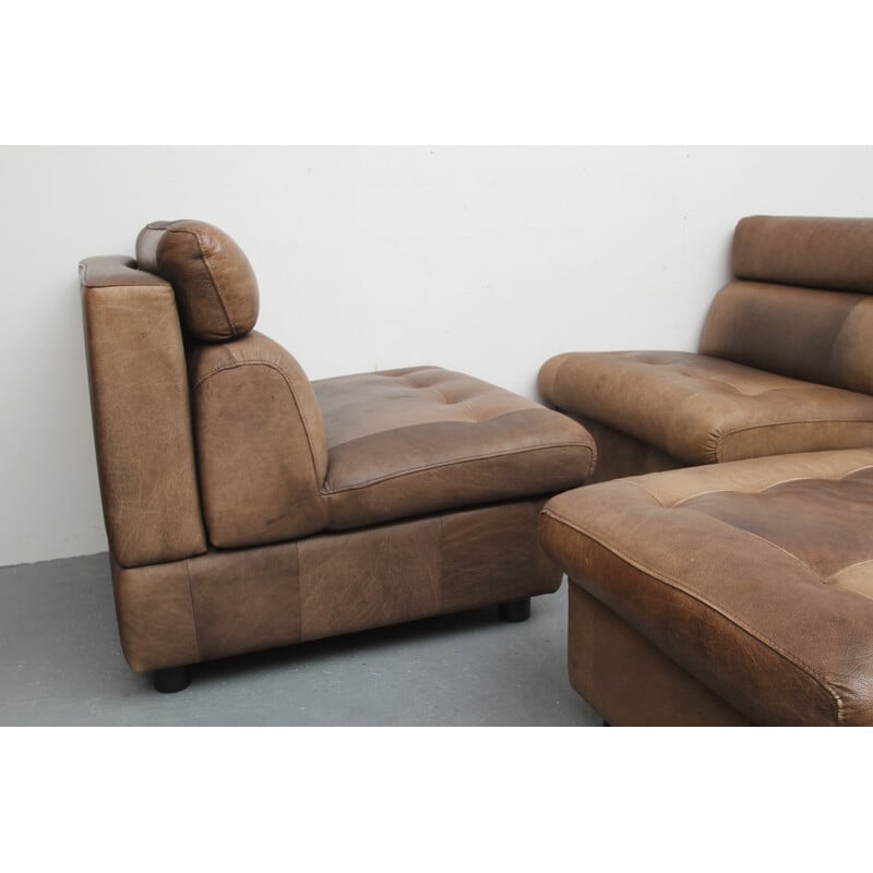 Pair of vintage buffalo leather armchairs and footrests, 1970