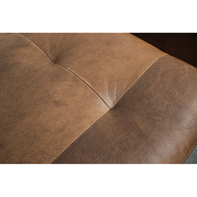 Pair of vintage buffalo leather armchairs and footrests, 1970