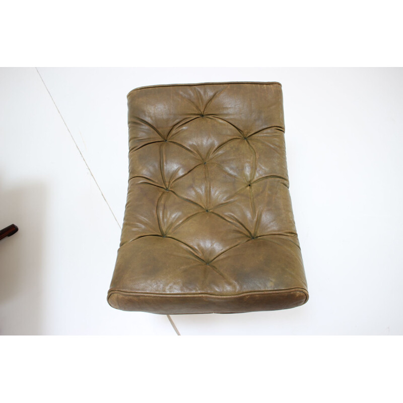 Vintage armchair with leather footrest Sweden