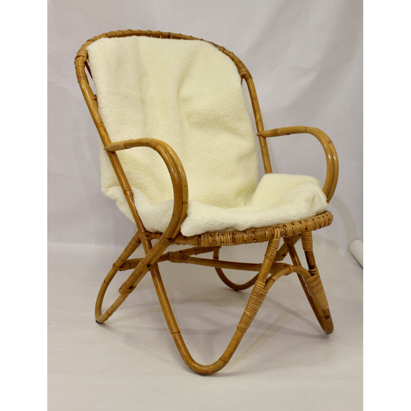 Vintage rattan armchair with butterfly feet 1960