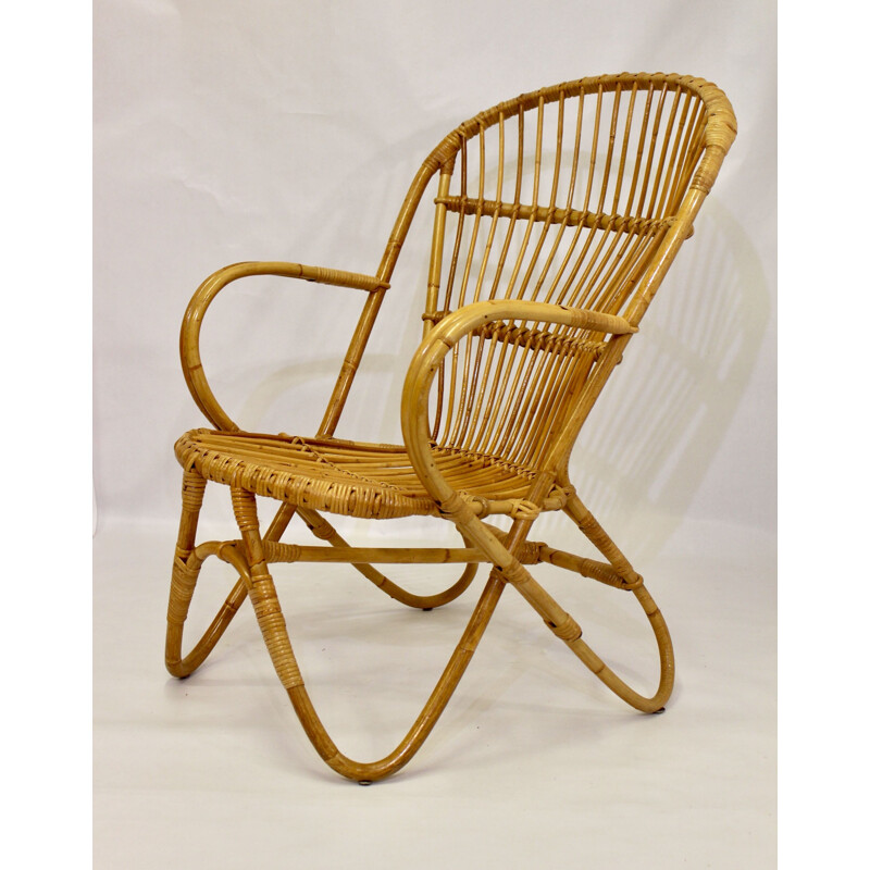 Vintage rattan armchair with butterfly feet 1960