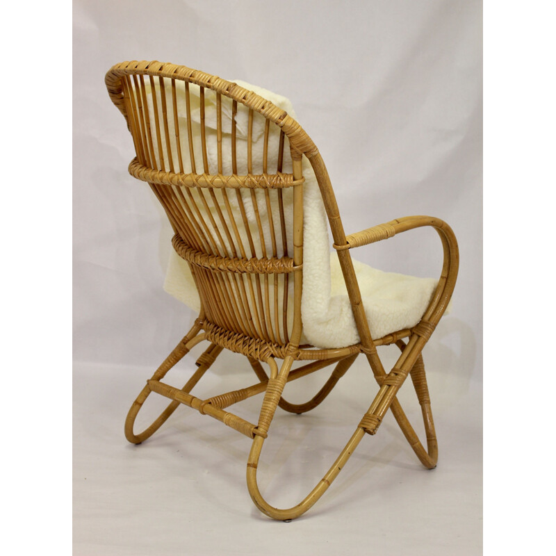 Vintage rattan armchair with butterfly feet 1960