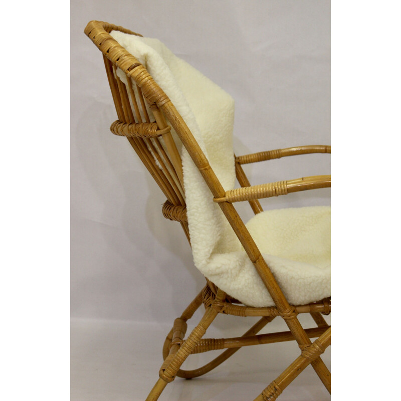 Vintage rattan armchair with butterfly feet 1960