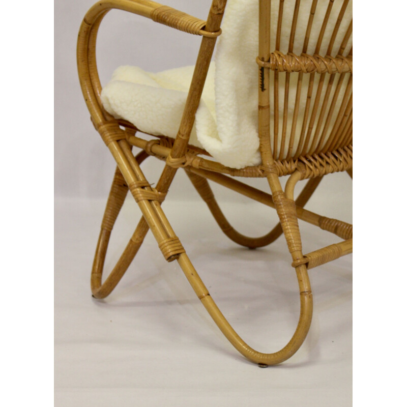 Vintage rattan armchair with butterfly feet 1960