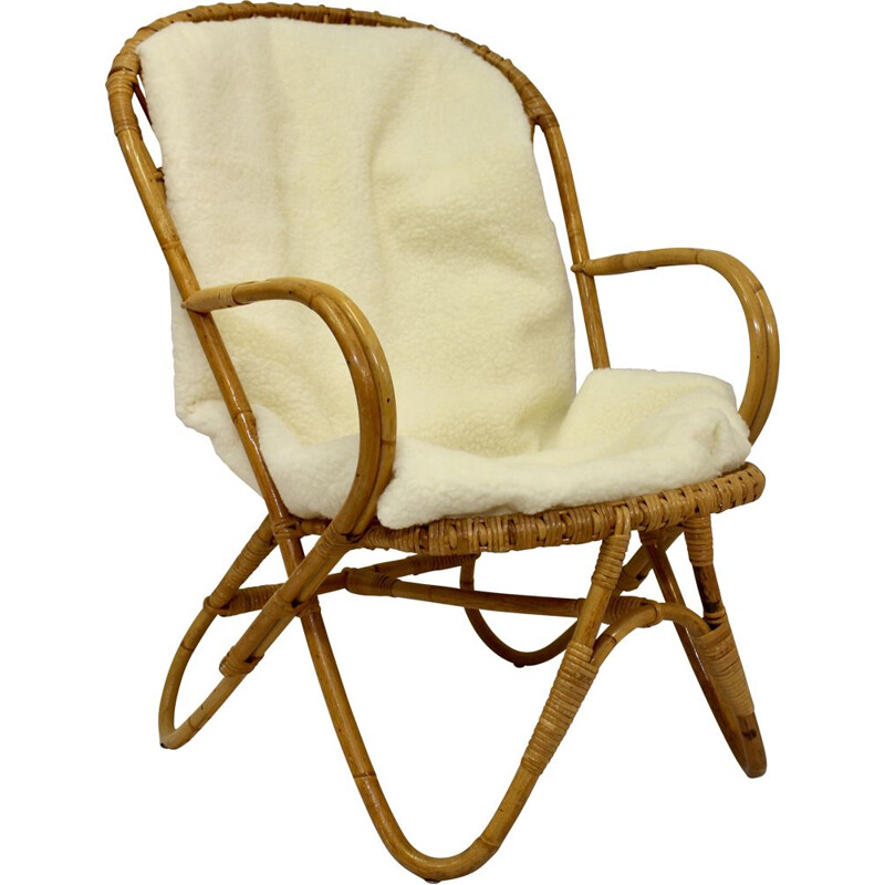 Vintage rattan armchair with butterfly feet 1960