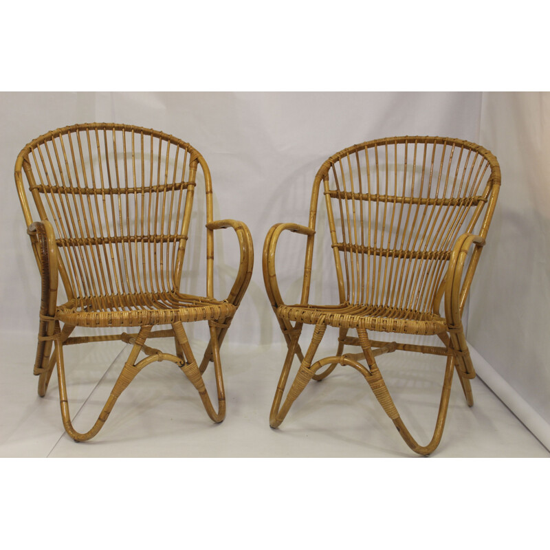 Paire de fauteuils vintage en rotin  pieds papillons 1960