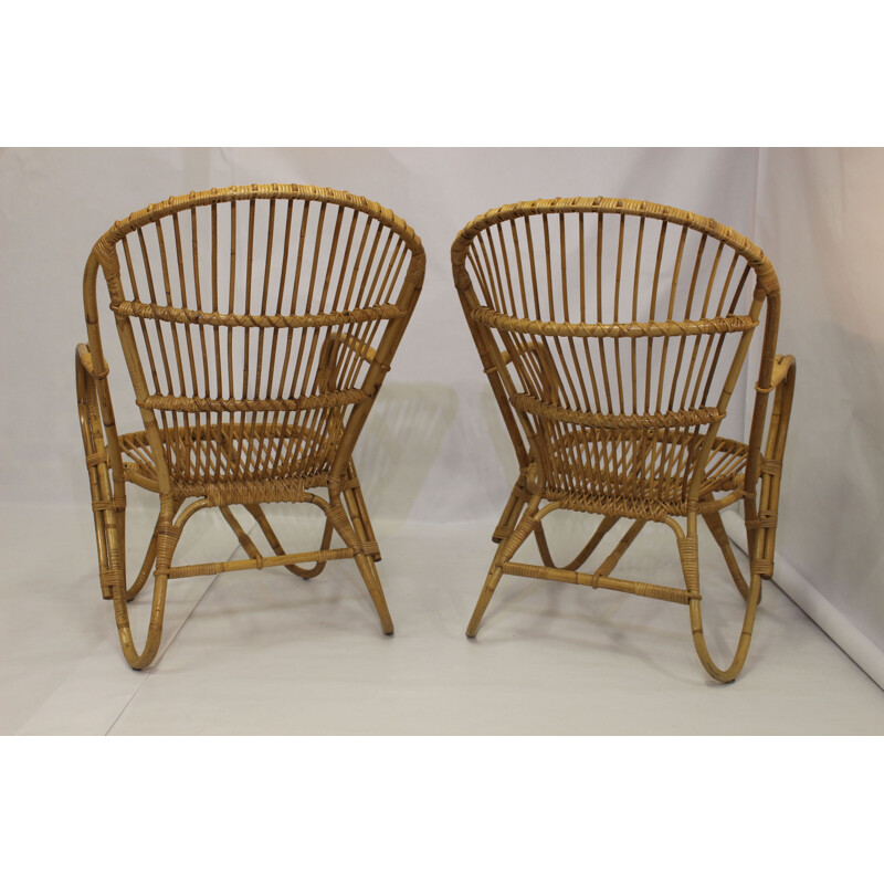 Paire de fauteuils vintage en rotin  pieds papillons 1960