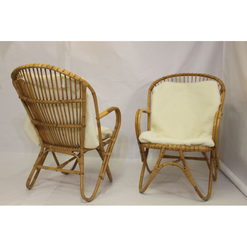 Pair of vintage rattan armchairs with butterfly legs 1960