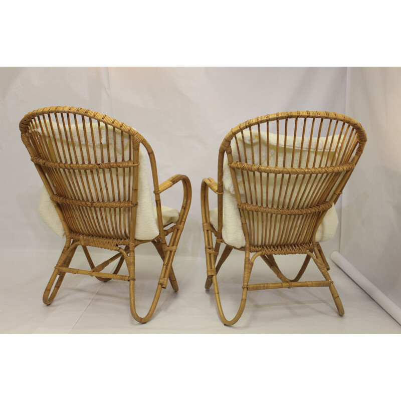 Pair of vintage rattan armchairs with butterfly legs 1960