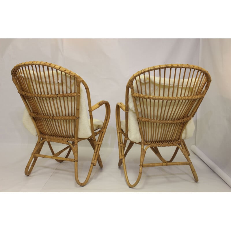 Paire de fauteuils vintage en rotin  pieds papillons 1960