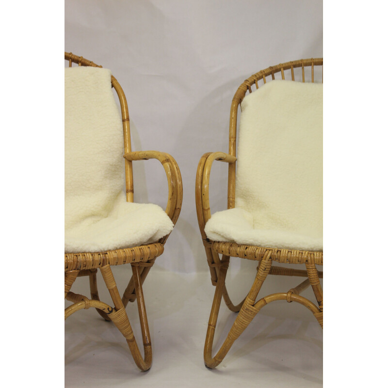 Pair of vintage rattan armchairs with butterfly legs 1960