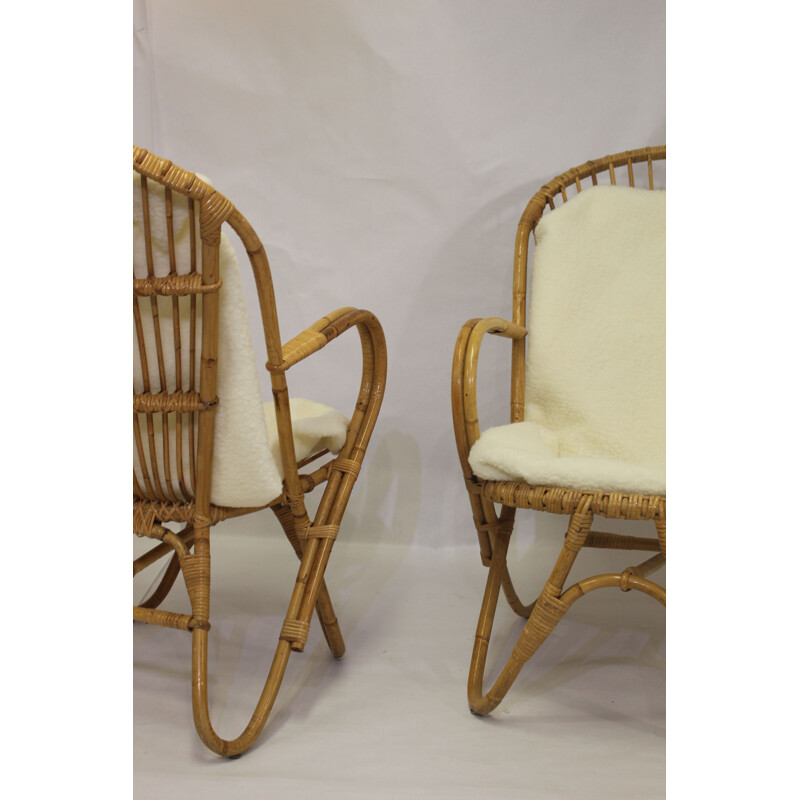 Pair of vintage rattan armchairs with butterfly legs 1960