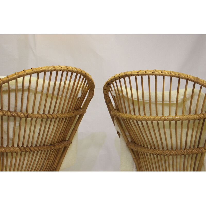 Pair of vintage rattan armchairs with butterfly legs 1960