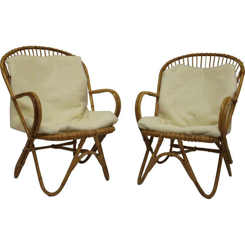 Pair of vintage rattan armchairs with butterfly legs 1960