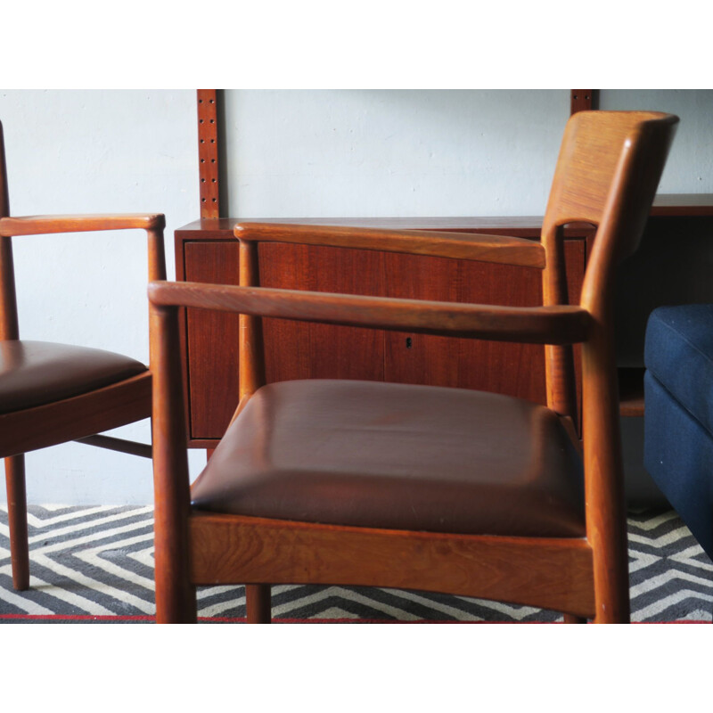 Paire de fauteuils vintage en teck et cuir sculpté Danemark 1960