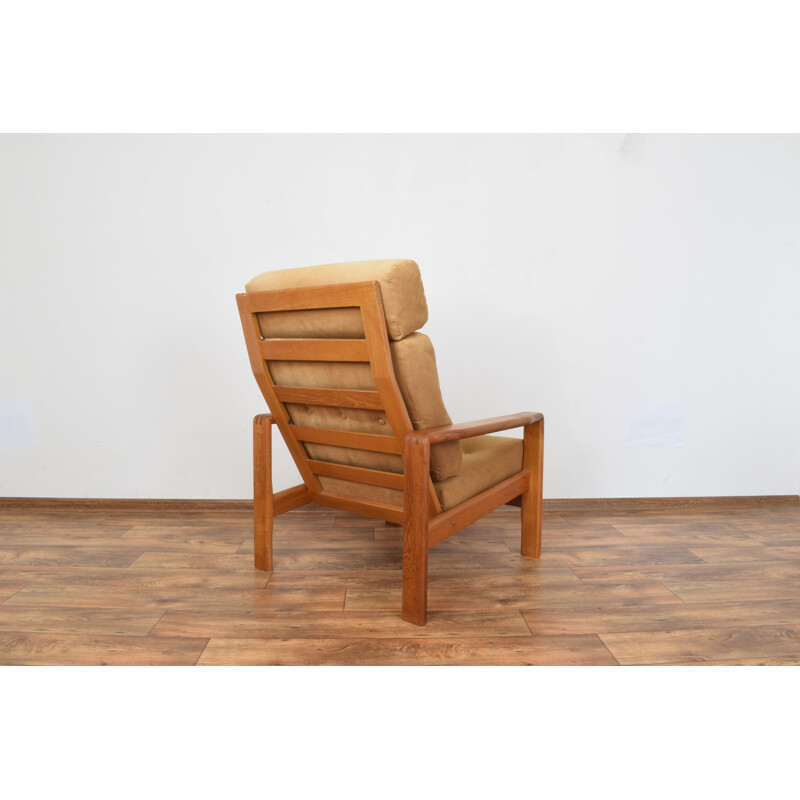 Vintage teak armchair with an ottoman Dyrlund Danish 1970