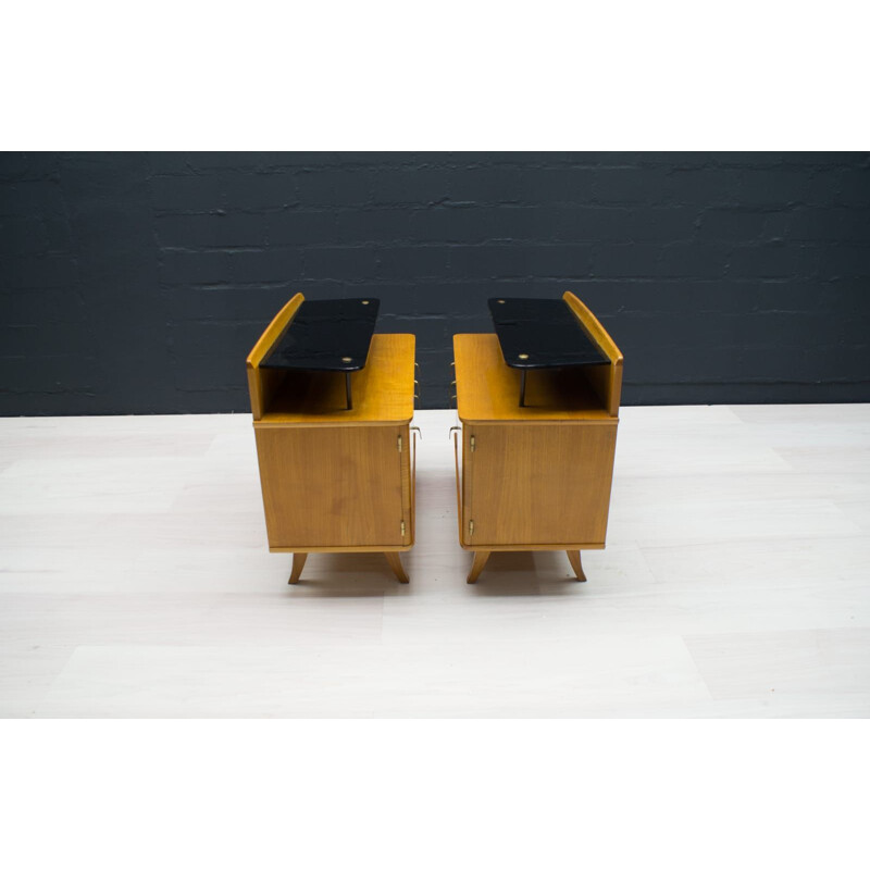 Pair of vintage dressers with black glass, 1950