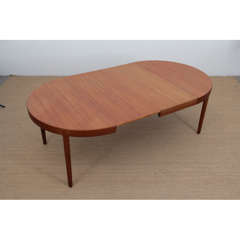 Vintage round Scandinavian teak dining table