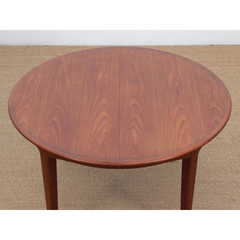 Vintage round Scandinavian teak dining table