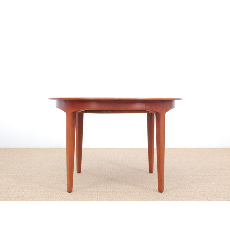 Vintage round Scandinavian teak dining table