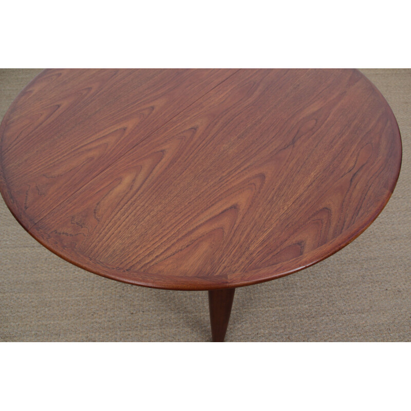 Vintage round Scandinavian teak dining table