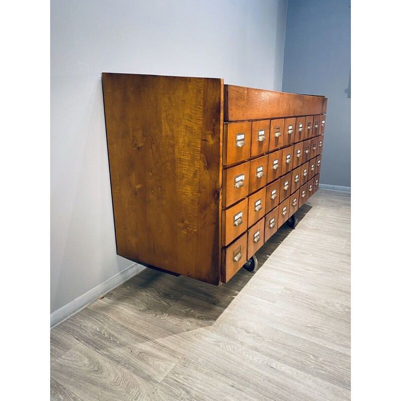 Large vintage industrial wooden chest of drawers with 32 filing drawers