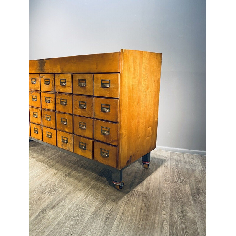 Large vintage industrial wooden chest of drawers with 32 filing drawers