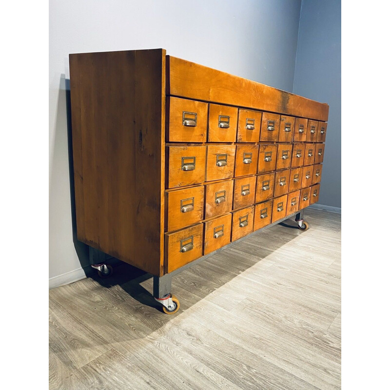 Large vintage industrial wooden chest of drawers with 32 filing drawers