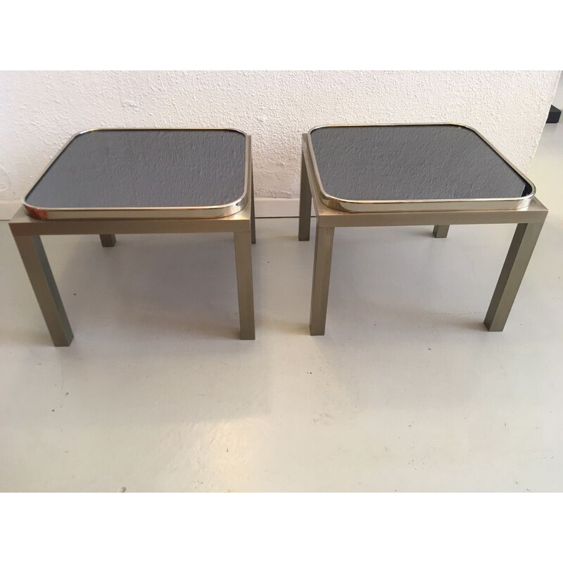 Coppia di tavolini vintage in acciaio spazzolato e vetro 1970