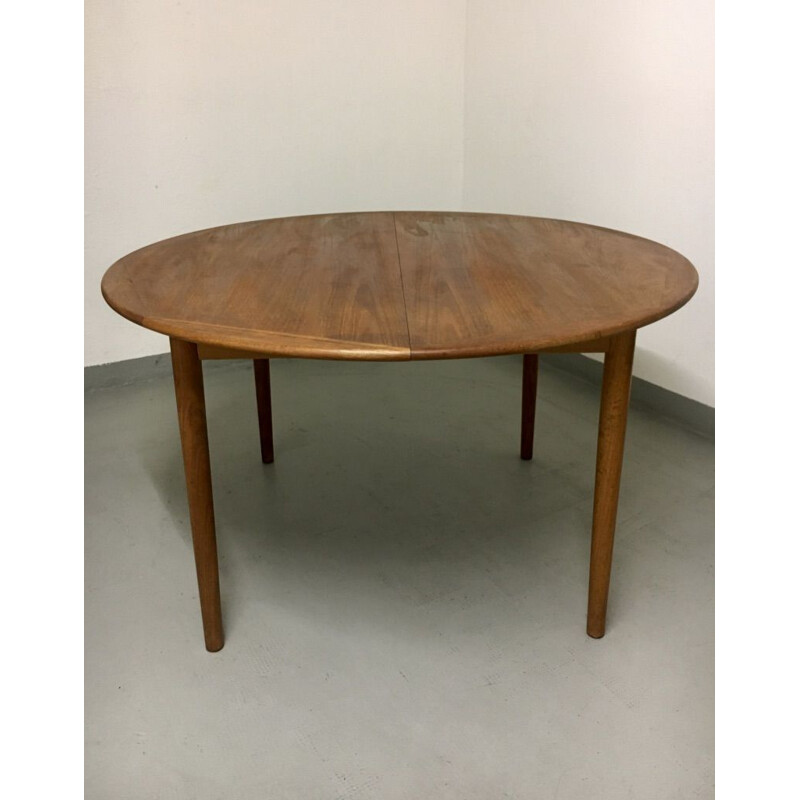 Vintage teak dining table with extension leaf