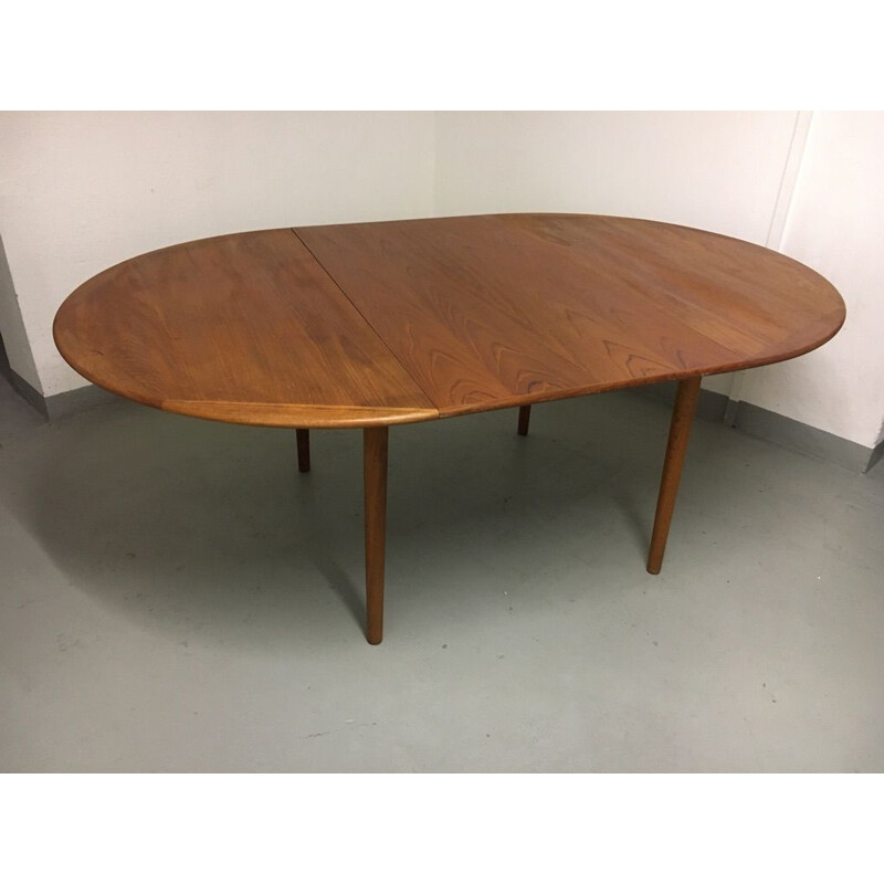 Vintage teak dining table with extension leaf