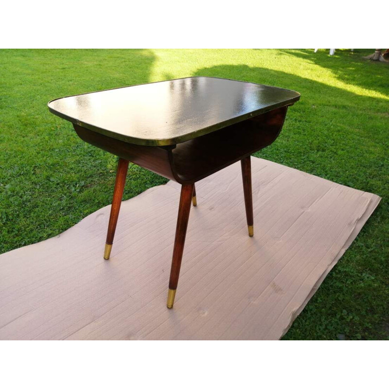 Vintage coffee table on spindly legs
