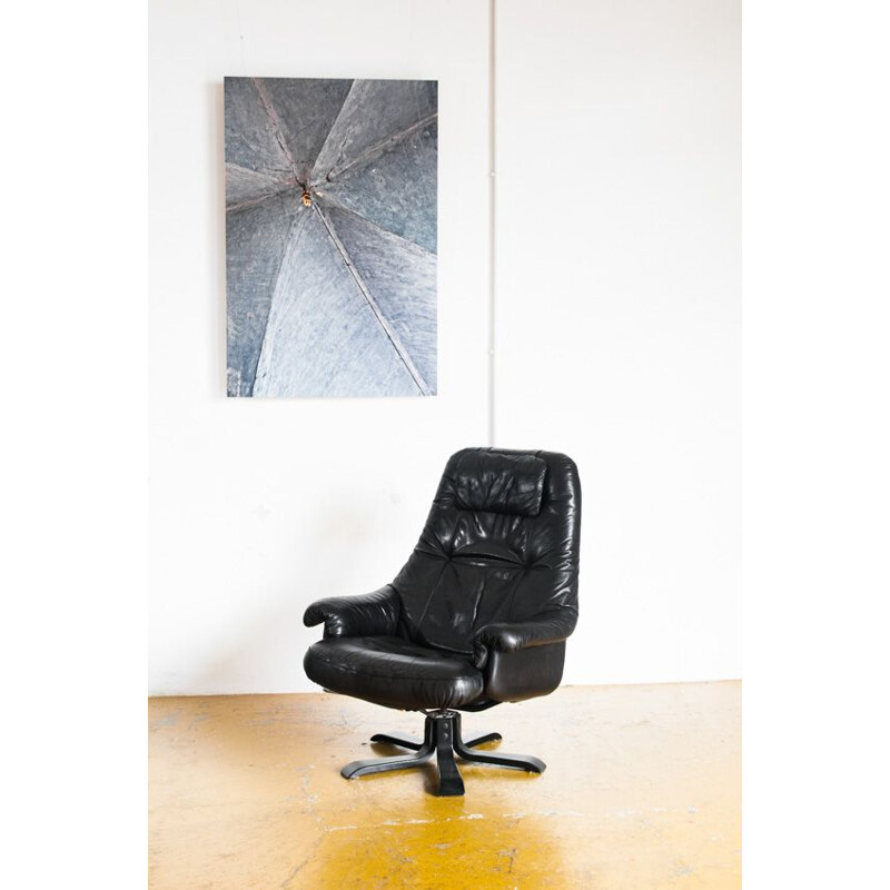 Vintage swivel armchair in wood and leather. Spain, 1980