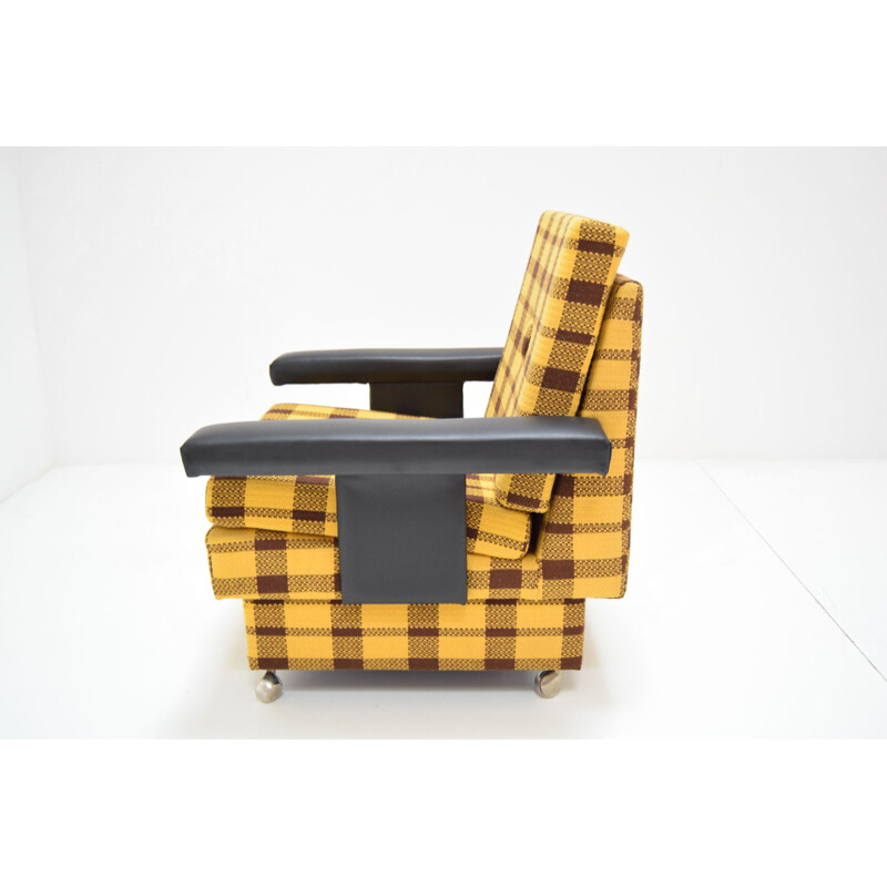 Vintage armchair with wheels 1970