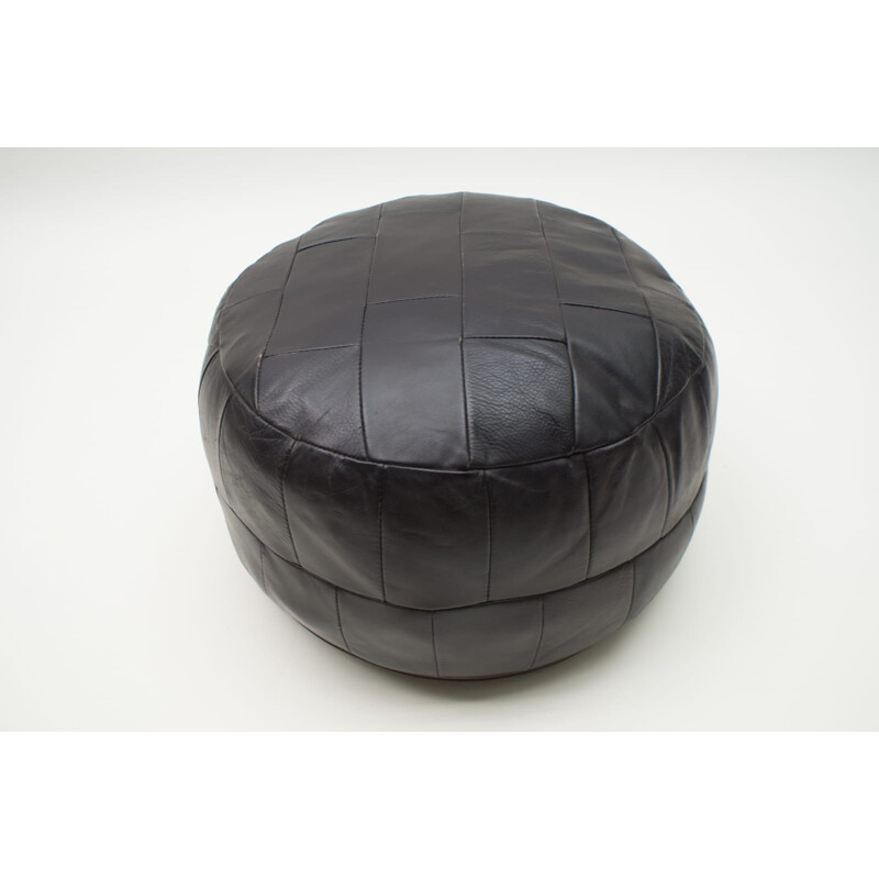 Vintage Swiss Black Leather Ottoman, 1960s