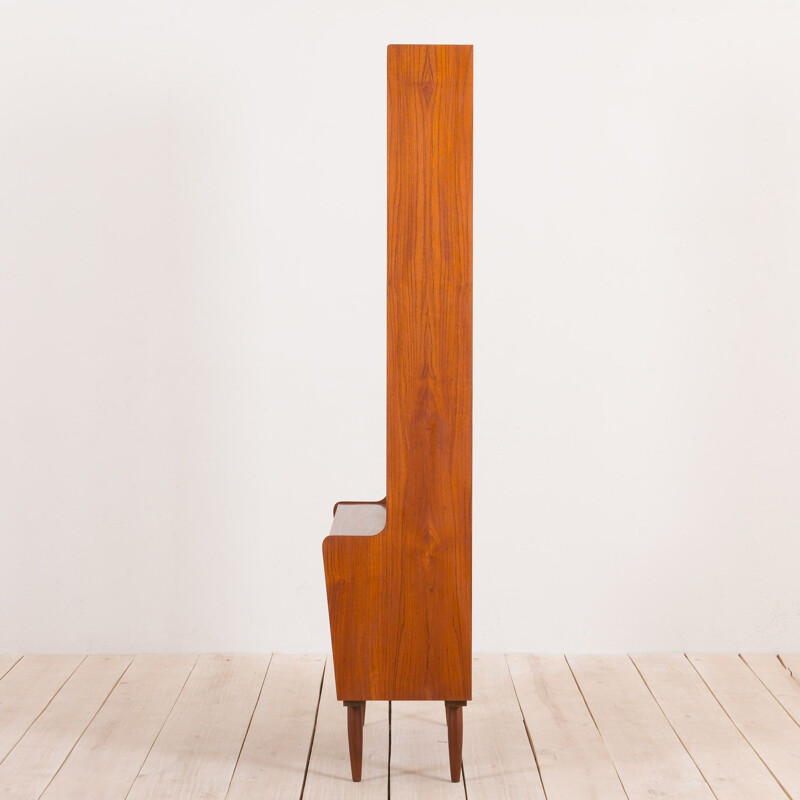 Vintage teak bookcase with a bar compartment to Johannes Sorth Danish 1950