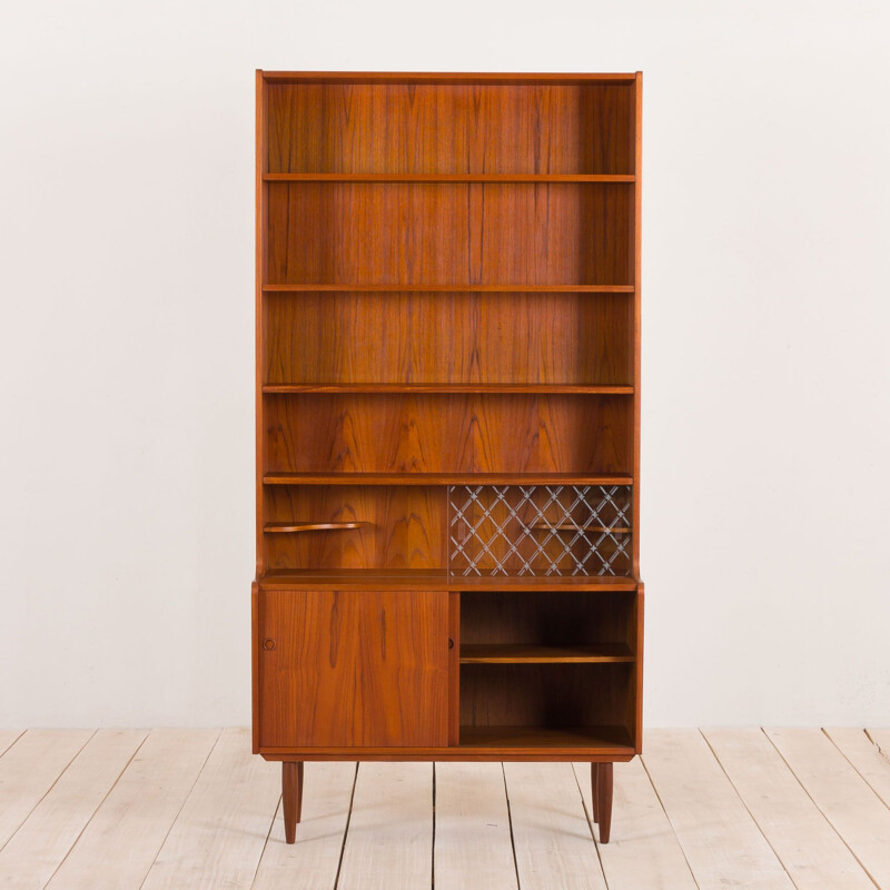 Vintage teak bookcase with a bar compartment to Johannes Sorth Danish 1950