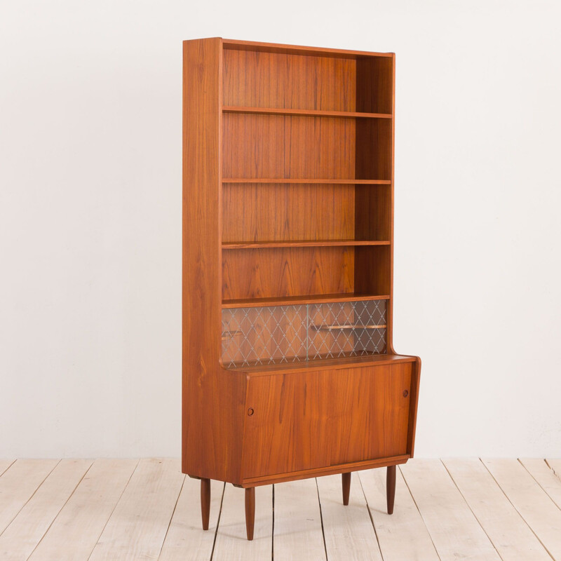 Vintage teak bookcase with a bar compartment to Johannes Sorth Danish 1950