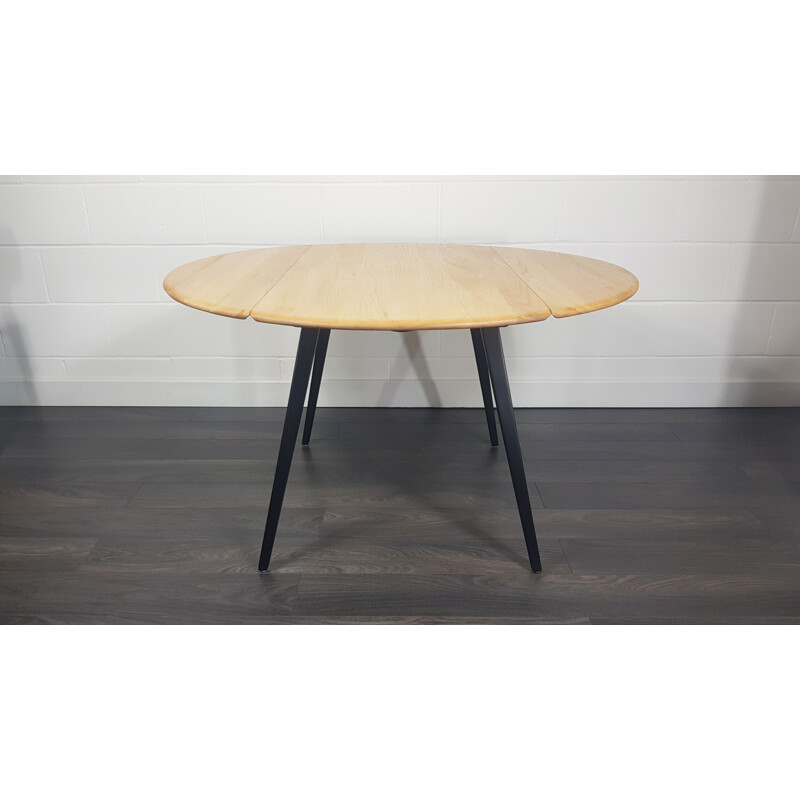 Vintage Drop Leaf Dining Table Ercol Round Black Leg, 1960s