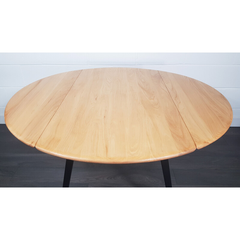 Vintage Drop Leaf Dining Table Ercol Round Black Leg, 1960s