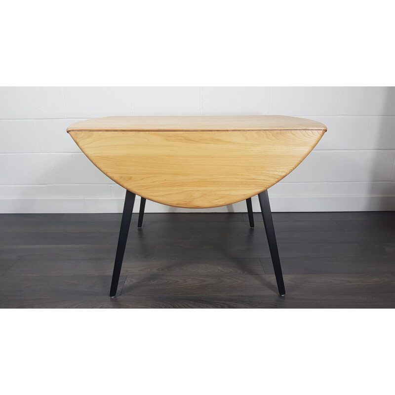 Vintage Drop Leaf Dining Table Ercol Round Black Leg, 1960s