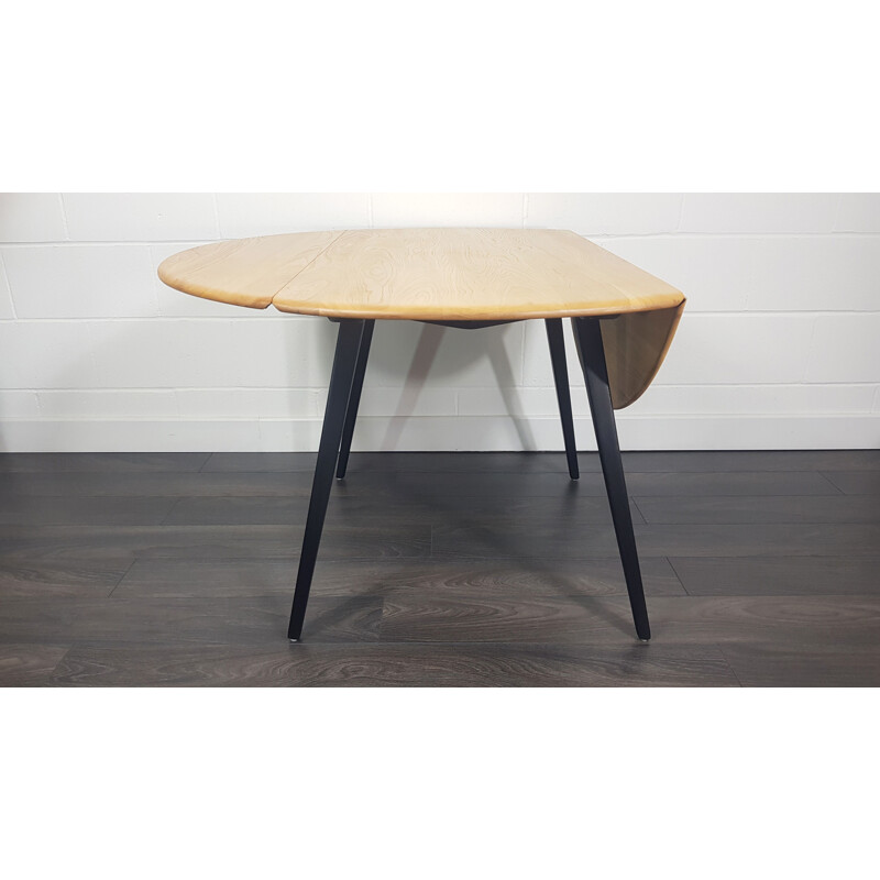 Vintage Drop Leaf Dining Table Ercol Round Black Leg, 1960s